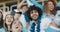 Group of cheering soccer fans from Argentina