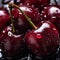 a group of cherries with water droplets on them