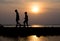 Group of child walking at sunset on the beach