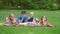 Group of Children are Bored while Picnicking