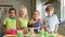 Group Of Children Celebrating Birthday With Cake And Gifts