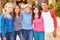 Group Of Children Hanging Out Together In Mall