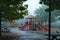 A group of children having fun while playing at a playground on a rainy day, with a bright red umbrella sheltering them, A lively