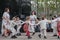 A group of children in national dress perform an Estonian folk dance