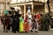 A group of children and people dressed in costume of mythical creatures on a carnival procession