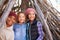 Group Of Children Playing In Forest Camp Together