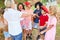 Group of children rehearsing talent show performance with teacher