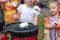 Group of children roasting marshmallows