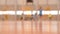 Group of children running and exercising in a sports hall, abstract blur scene background