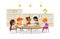 Group of children sitting around table at school library and listening to girl reading book out loud against bookcase or