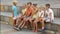 Group of children sitting on bench