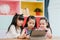 Group of children using tablet in classroom, Multi-ethnic young boys and girls happy using technology for study and play games at