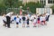 Group of children warming up and preparing for the main part of lesson.  Sport school