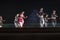 Group of Classical Odissi dancers performing Odissi Dance on stage at Konark Temple, Odisha, India.