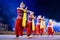 A group of Classical Odissi dancers performing Odissi Dance on stage at Konark Temple, Odisha, India.