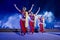 A group of Classical Odissi dancers performing Odissi Dance on stage at Konark Temple, Odisha, India.