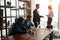 Group of clever talented business people planning work in office