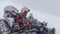 Group of climbers freezing at the summit of the Cotopaxi volcano while waiting for the snowstorm to pass to begin to descend