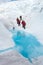 Group of climbers in a surreal world of ice