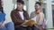 a group of college students talk on the campus of the university during a break