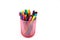 Group of color felt-tipped pens in a glass, white background