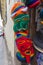 Group of colored woolen masks for sale at the market in Cusco, P