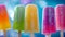 A group of colorful popsicles on sticks with a blue background, AI