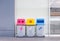 Group of colorful recycle bins, Different colored bins for collection of recycled materials. Garbage bins with garbage bags of