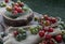 Group of Colorful variety of Fresh wild tomatoes Mini Cherry Tomatos on old wooden board background