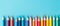 Group of colourful pencils over blue background.