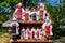 Group of colourful textile traditional hand made decorations, dolls and  toys for children, available for sale at a traditional