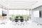 Group of conference table and chairs in white and wide office wi