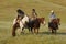 Group of Cowboys with Dog