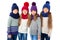 Group of cute kids in winter warm hats and scarfs on white. Children winter clothes