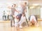 Group of dancing teenagers posing in dance studio