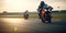 A group of daring extreme athletes ride their sport motorcycles at high speeds on a race track. Generative AI