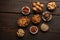 Group of delicious dried fruits over a wooden background