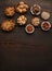 Group of delicious dried fruits over a wooden background