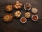 Group of delicious dried fruits over a wooden background