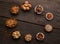 Group of delicious dried fruits over a wooden background