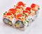 Group of delicious salmon uramaki rolls over isolated white background