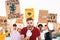 Group demonstrators protesting against plastic pollution and climate change - Multiracial people fighting on road holding banners