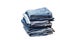 Group of different blue jeans on white background