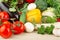 Group of different vegetables on wooden board