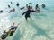 Group of divers in the sea learn how to float