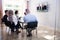 Group Of Diverse Businesspeople Video Conferencing In Boardroom