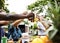 Group of diverse friends celebrating drinking beers together summer time