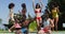 Group of diverse friends dancing and enjoying near the pool