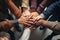 Group of diverse people joining hands together. Teamwork concept. Top view, Group of diverse hands holding each other support