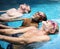 Group of diverse senior men enjoying the pool together